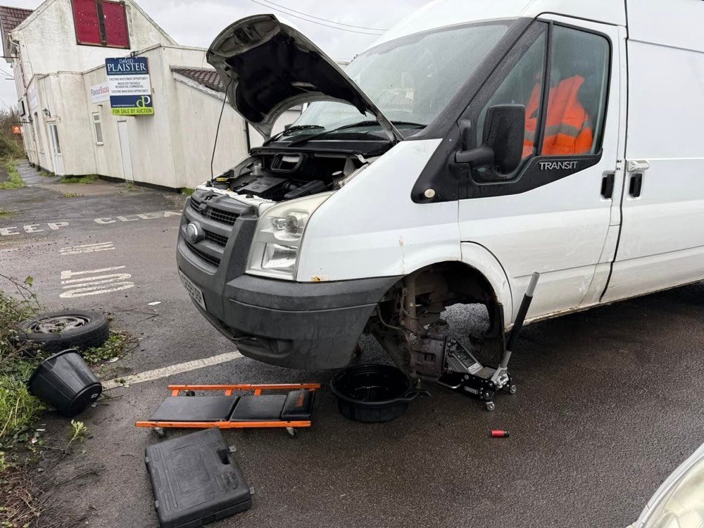 Roadside repair on a Ford Transit van